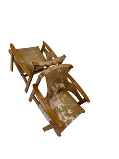 Carl Axel Acking fauteuils de salon Trienna en cuir de vache brésilien