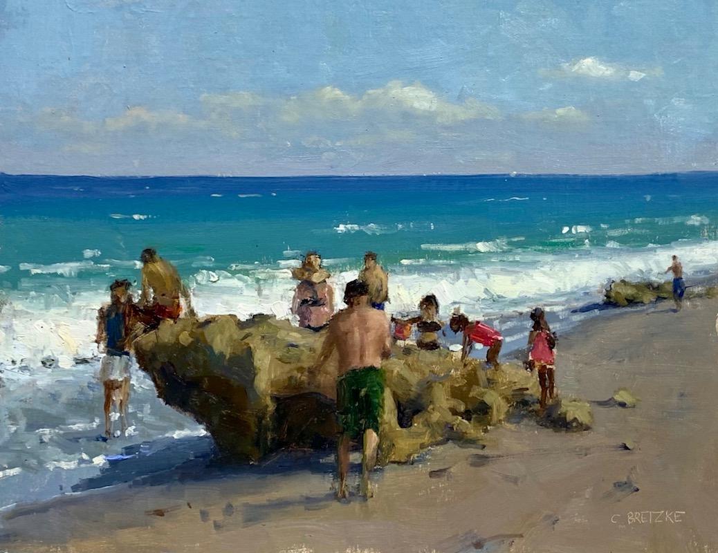 Figurative Painting di Carl Bretzke - "Coral Cove Rock", pittura a olio, bagnanti che si riuniscono attorno a un grande masso