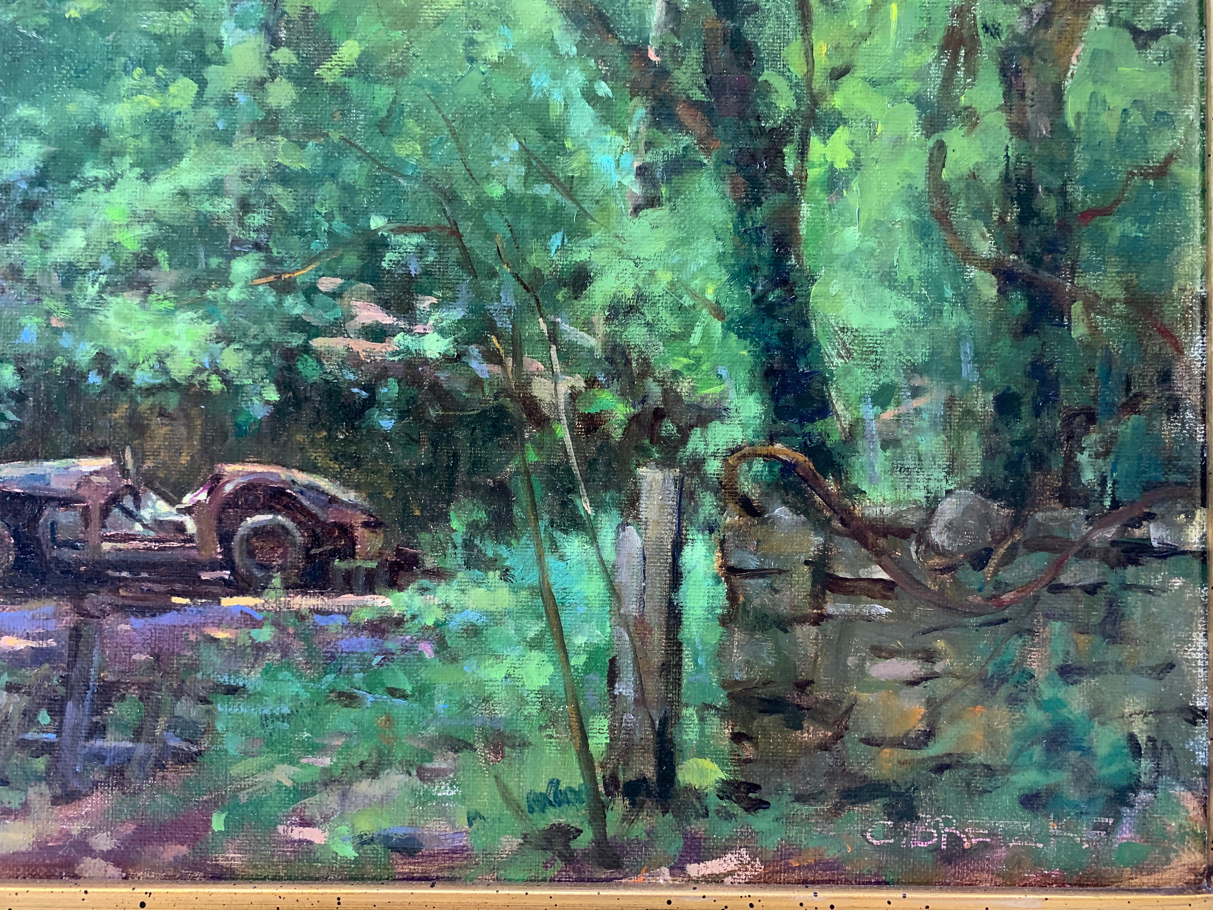 An oil painting of a verdant, wooded area, painted en-plein air in Arkansas. An old, rusted, abandoned race-car, a BMW Triumph, is the focal point behind a time-honored stone wall. Dappled light peeks through the trees from above, casting spots of