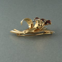 CARL BUCHER- Spilla con granato e diamanti taglio singolo in oro 18 carati