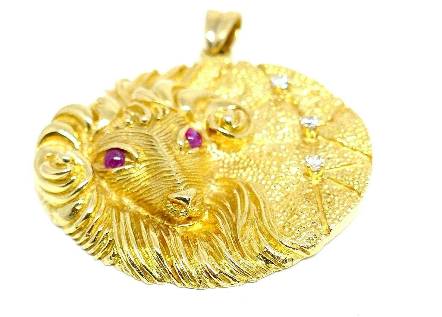 Aries astrological medallion pendant by Carl F. Bucherer. Made of hammered 18k yellow gold features diamond and tourmaline.
Diameter is 1.5