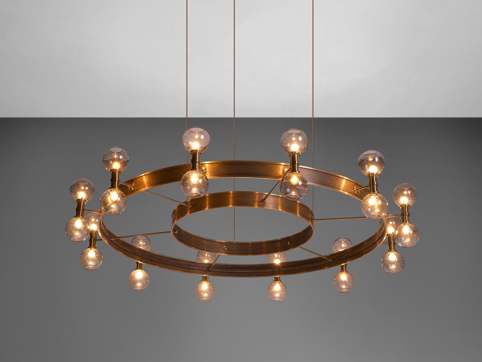 Carl Corwin, gigantic chandelier, brass and glass, Norway, 1958

Extremely large chandelier designed by Carl Corwin. This grand chandelier has a diameter of 220 cm and used to be housed in the Kong Haakon's Church in Copenhagen. The chandelier was