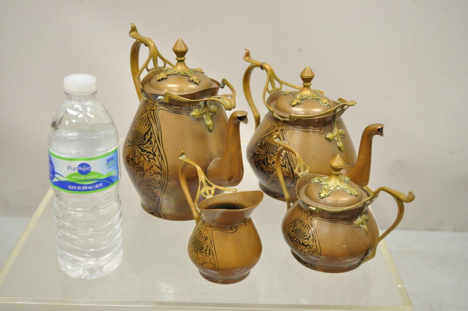 Carl Deffner Copper German Art Nouveau Thistle tea set - 4 pc Set. Circa 19th Century.
Measurements: 
Tea Pot: 6.25