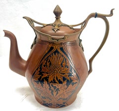 Carl Deffner, Esslingen A three-piece Arts & Crafts Copper and Brass  circa 1900