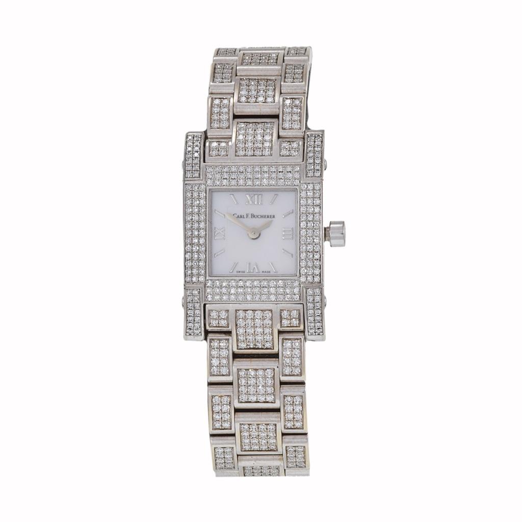 The Carl F. Bucherer Pathos timepiece from the 1990s embodies timeless elegance with its 18Kt white gold 18mm square diamond case and matching bracelet. Featuring a quartz movement, it offers precision timekeeping while maintaining its luxurious