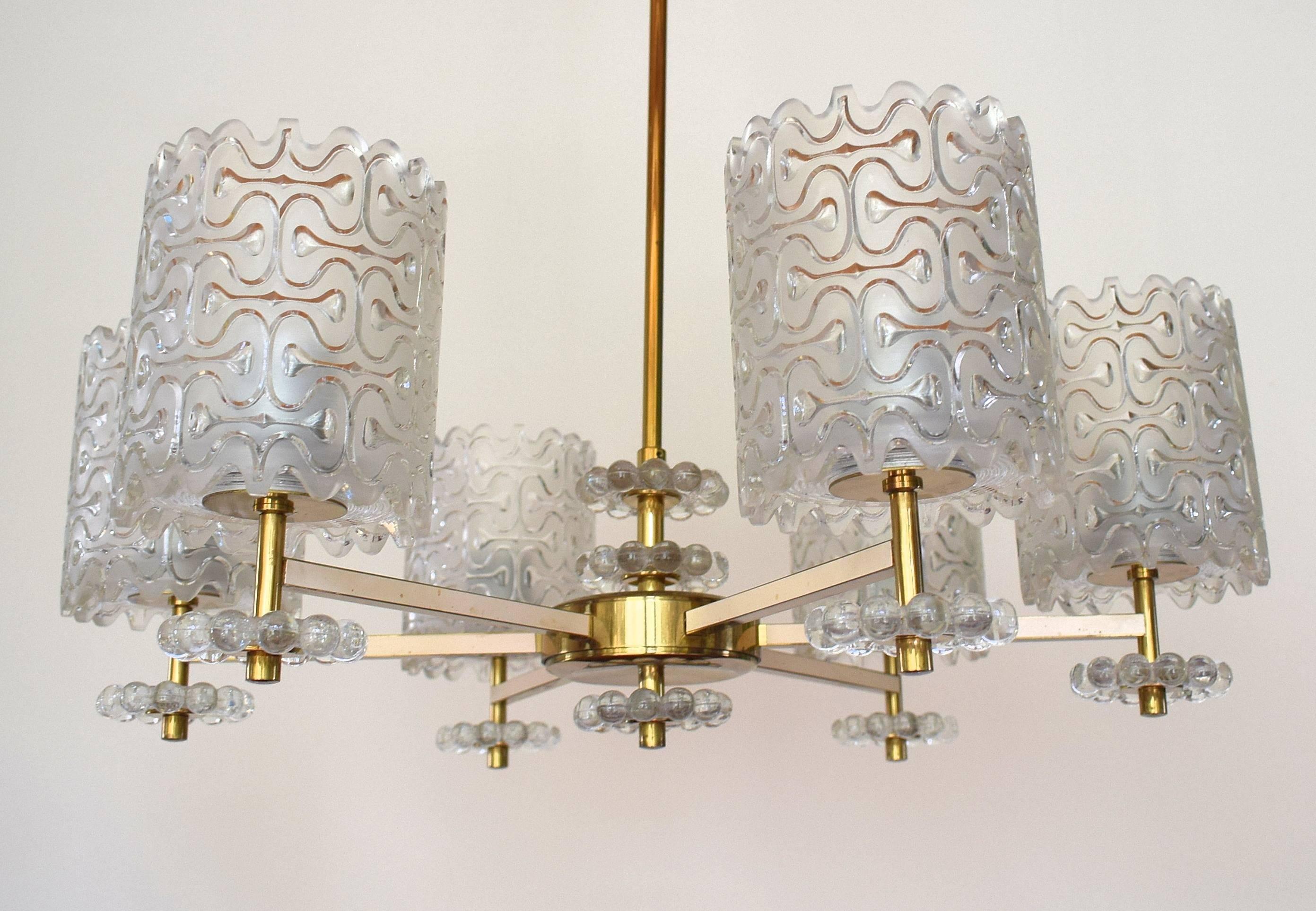 Carl Fagerlund attributed hanging chrome and glass for Orrefors.
Noble chandelier. Six arms with lampshades made of solid frosted glass.
The frame is made of white painted brass.

Weight: approximate 15 kg.

Excellent condition.
