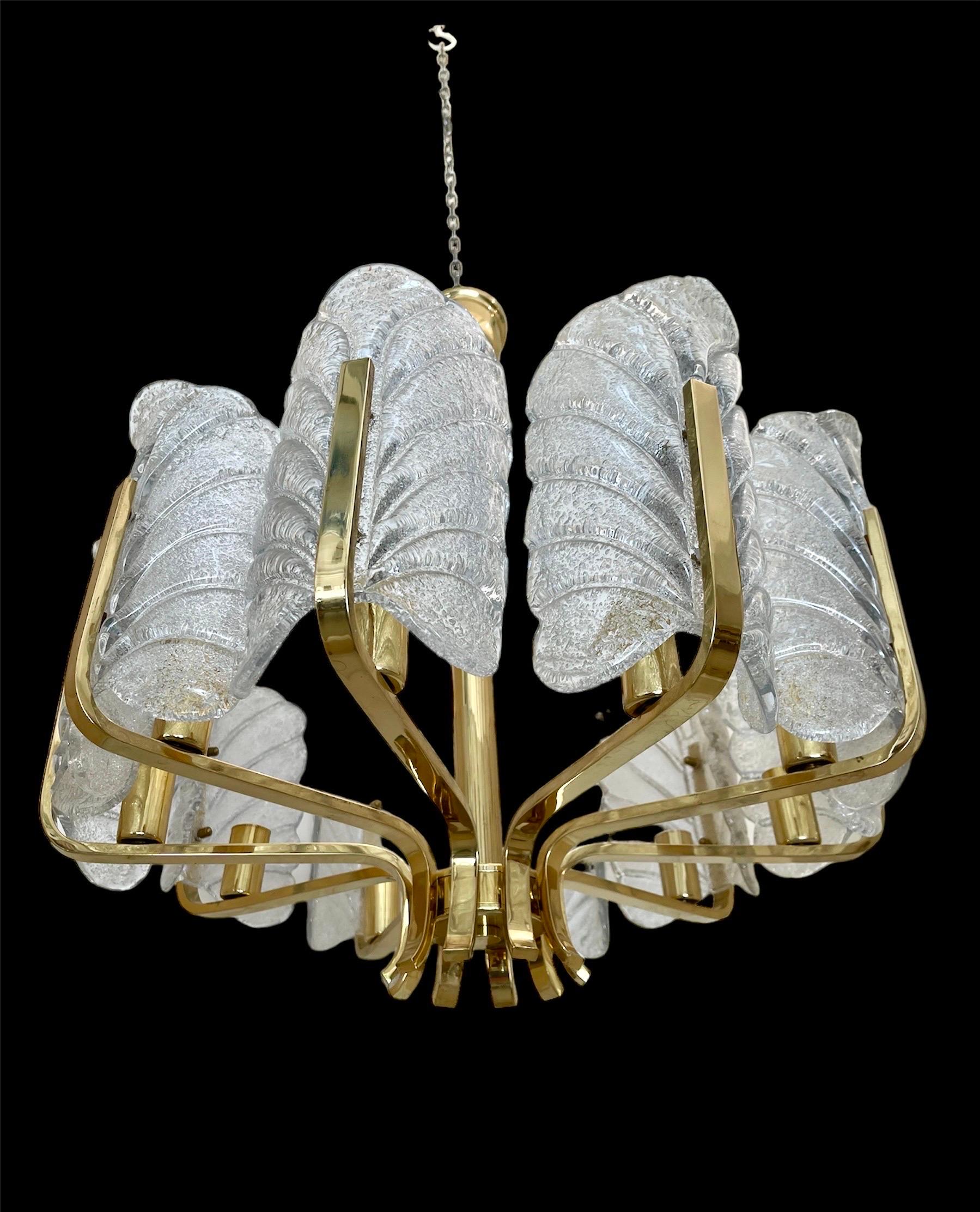 Carl Fagerlund by Orrifors Chandelier with glass of murano in frosted glass design. Very rare model of glass with a golden brass structure. An iconic lamp of danish design, a unique element for an atmosphere of great luxury.

discount shipping to