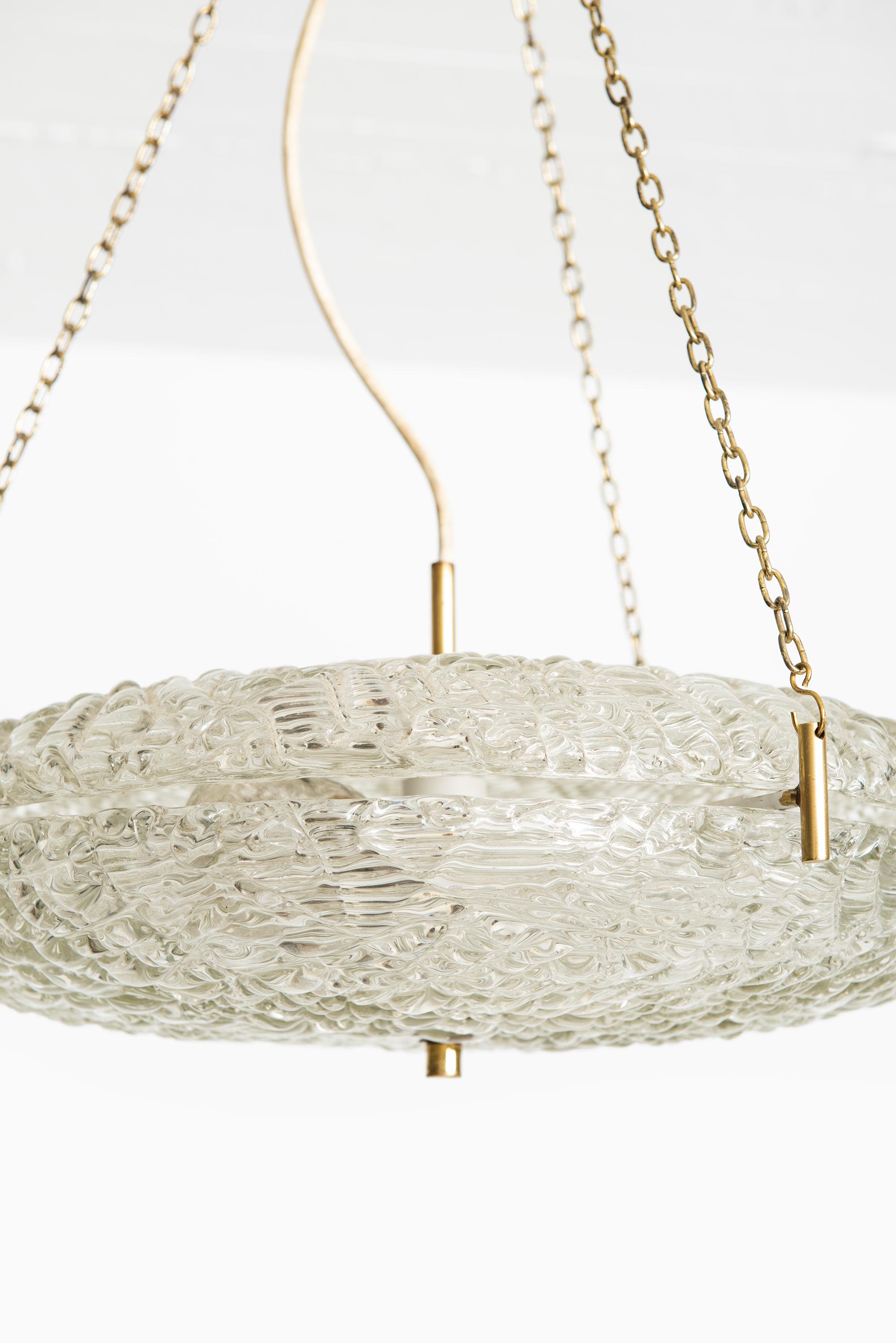 Swedish Carl Fagerlund Ceiling Lamp in Brass and Glass by Orrefors in Sweden