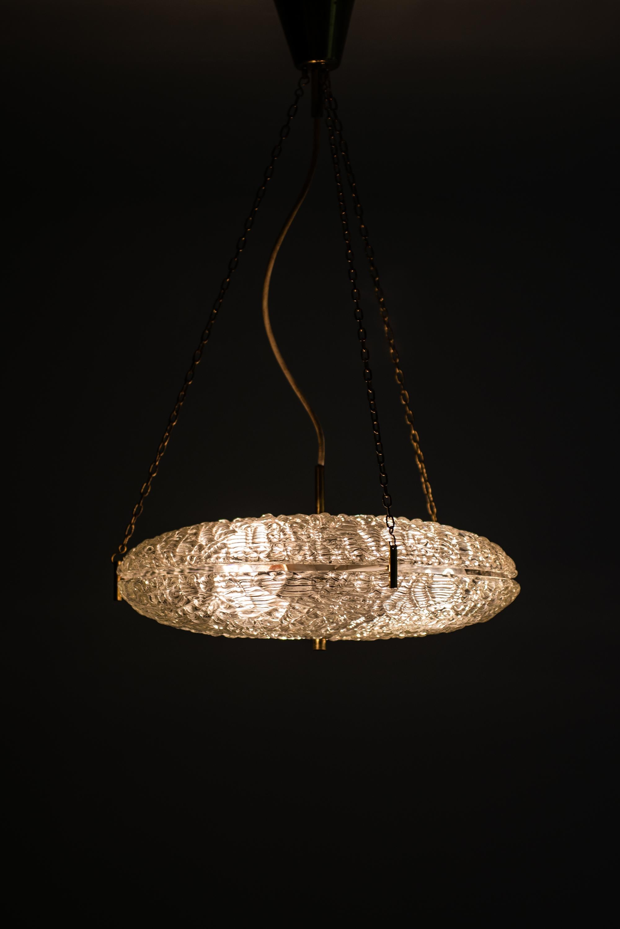 Carl Fagerlund Ceiling Lamp in Brass and Glass by Orrefors in Sweden In Good Condition In Limhamn, Skåne län