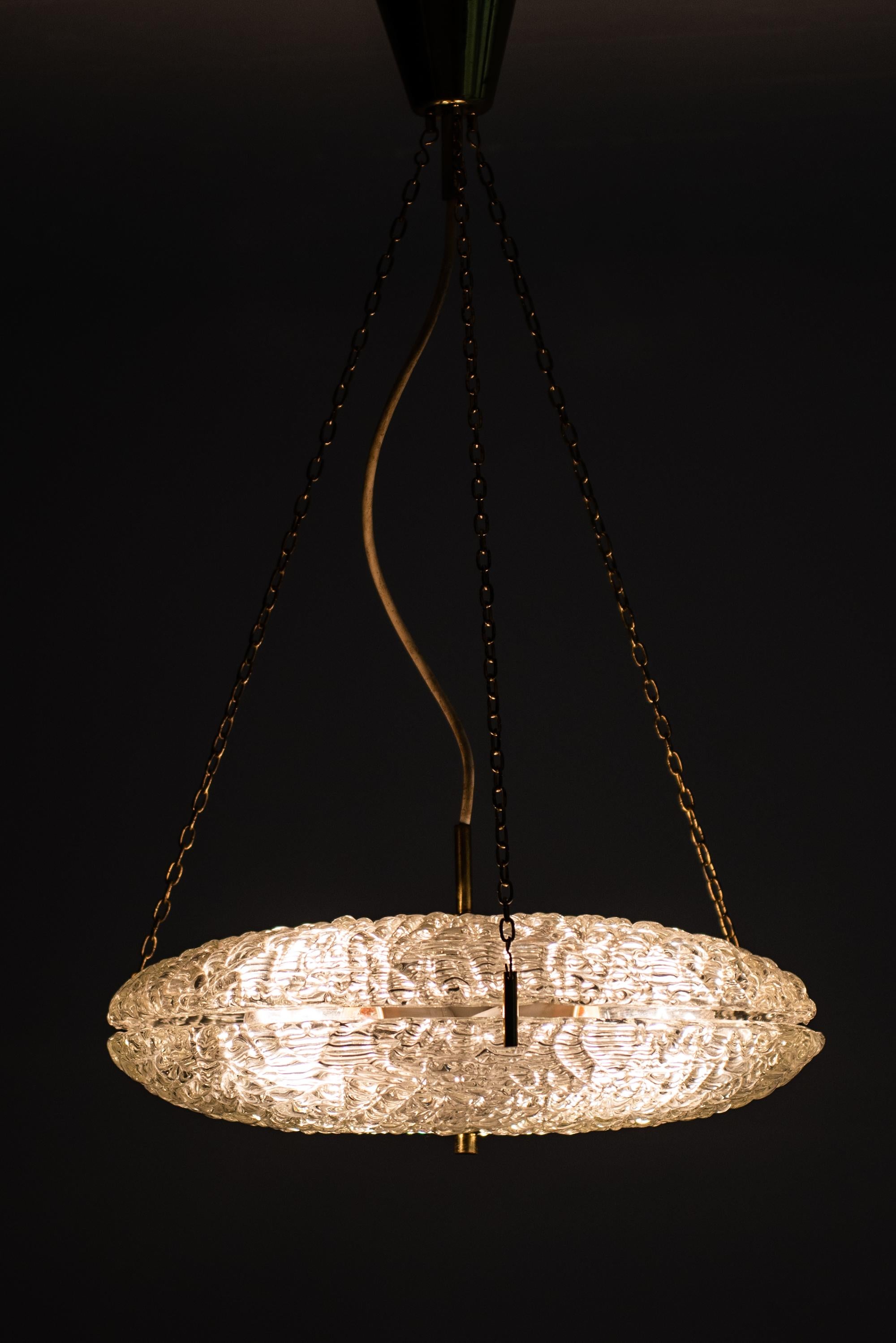 Carl Fagerlund Ceiling Lamp in Brass and Glass by Orrefors in Sweden 3