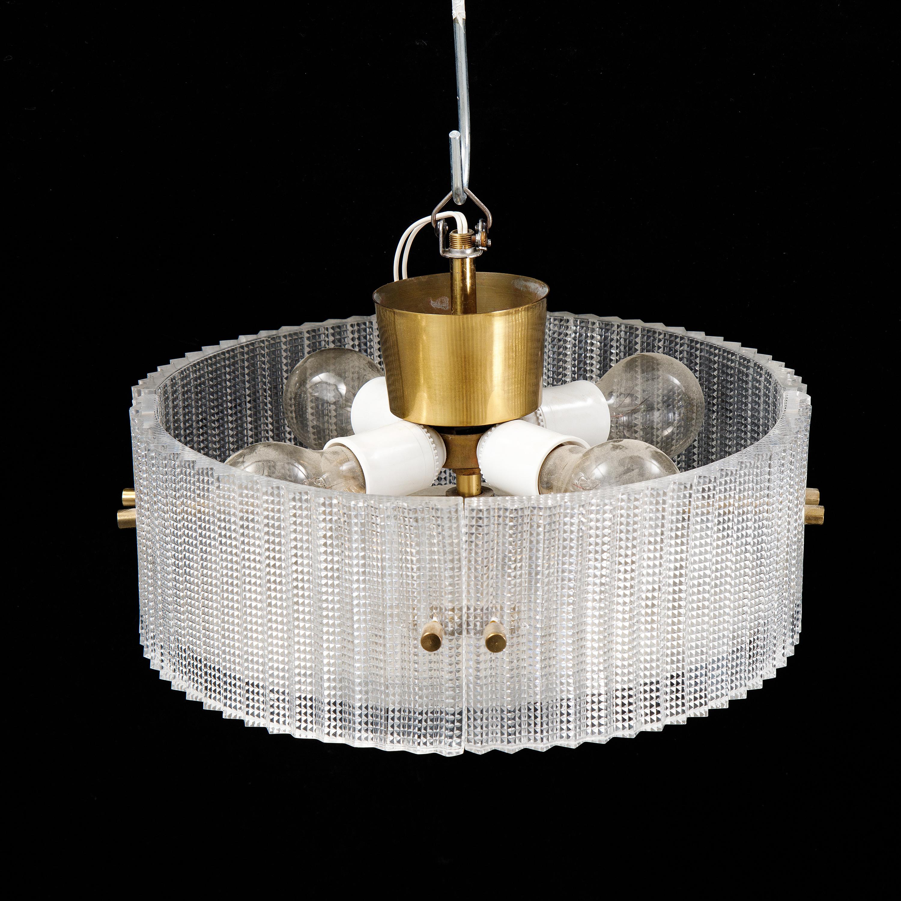 Carl Fagerlund ceiling light for Orrefors made in Sweden 1960
Model made of Glass mounted on a brass structure with beautiful details
Good condition 
A pair is available price for 1 item

Many museums, churches and corporate headquarters house