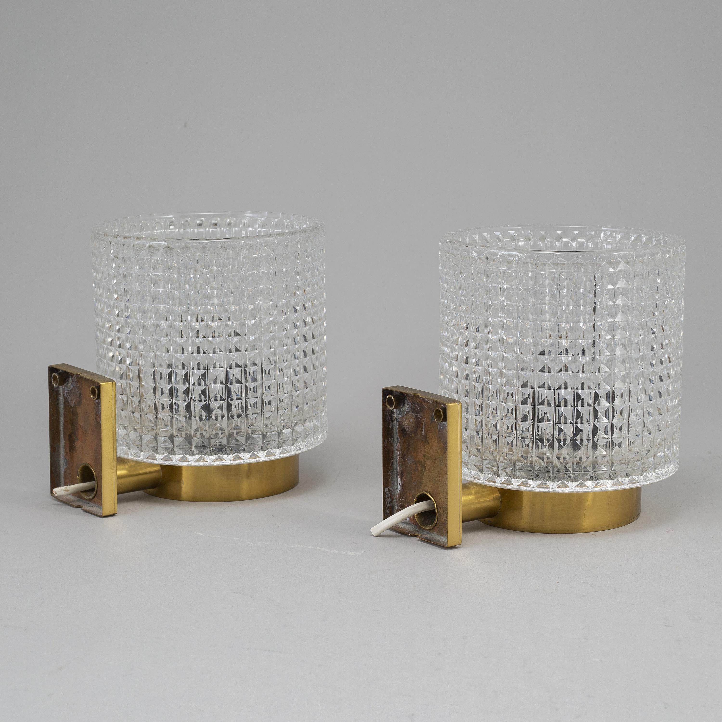 Mid-Century Modern Carl Fagerlund for Orrefors Brass and Glass Pair of Sconces