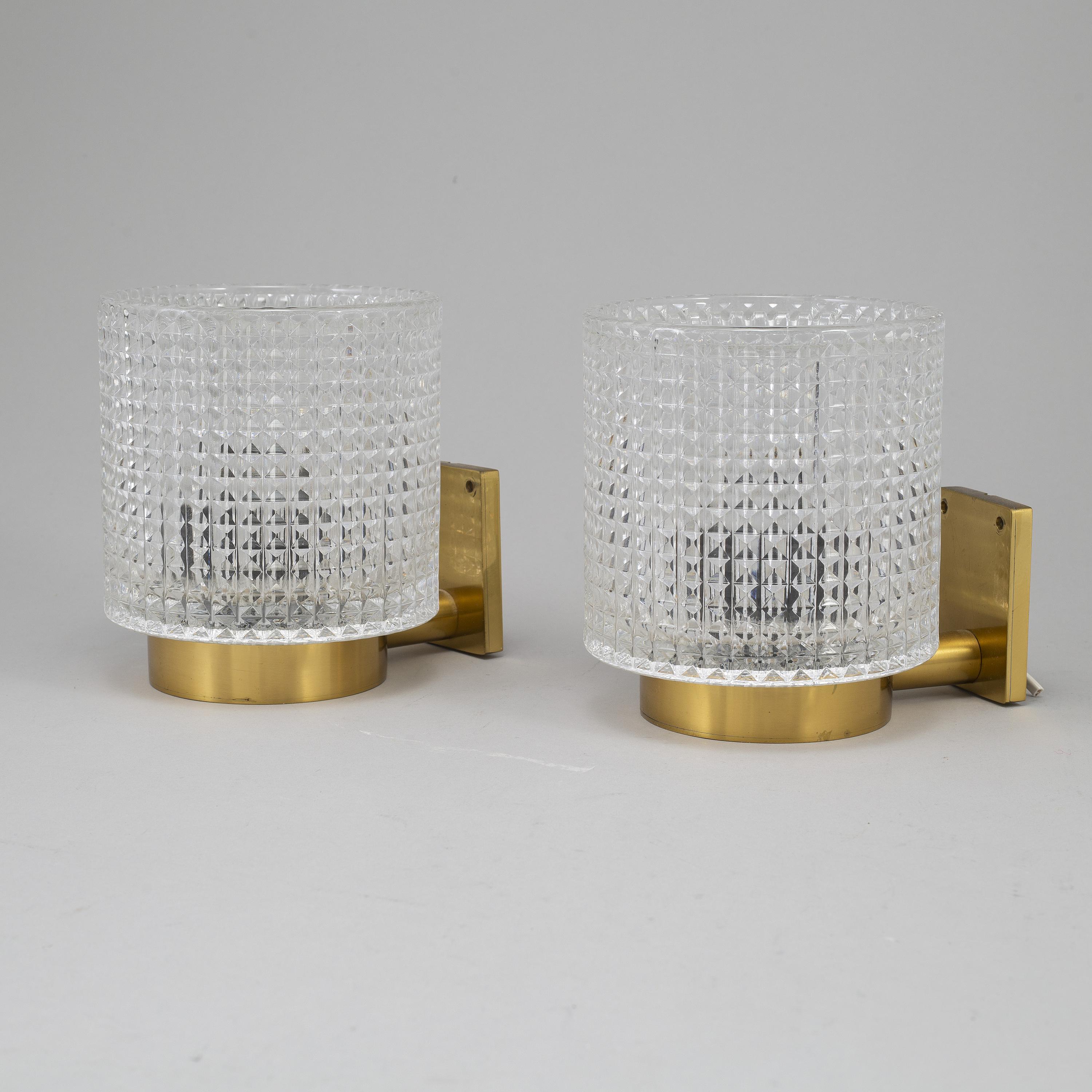 Carl Fagerlund for Orrefors Brass and Glass Pair of Sconces In Excellent Condition In Paris, FR