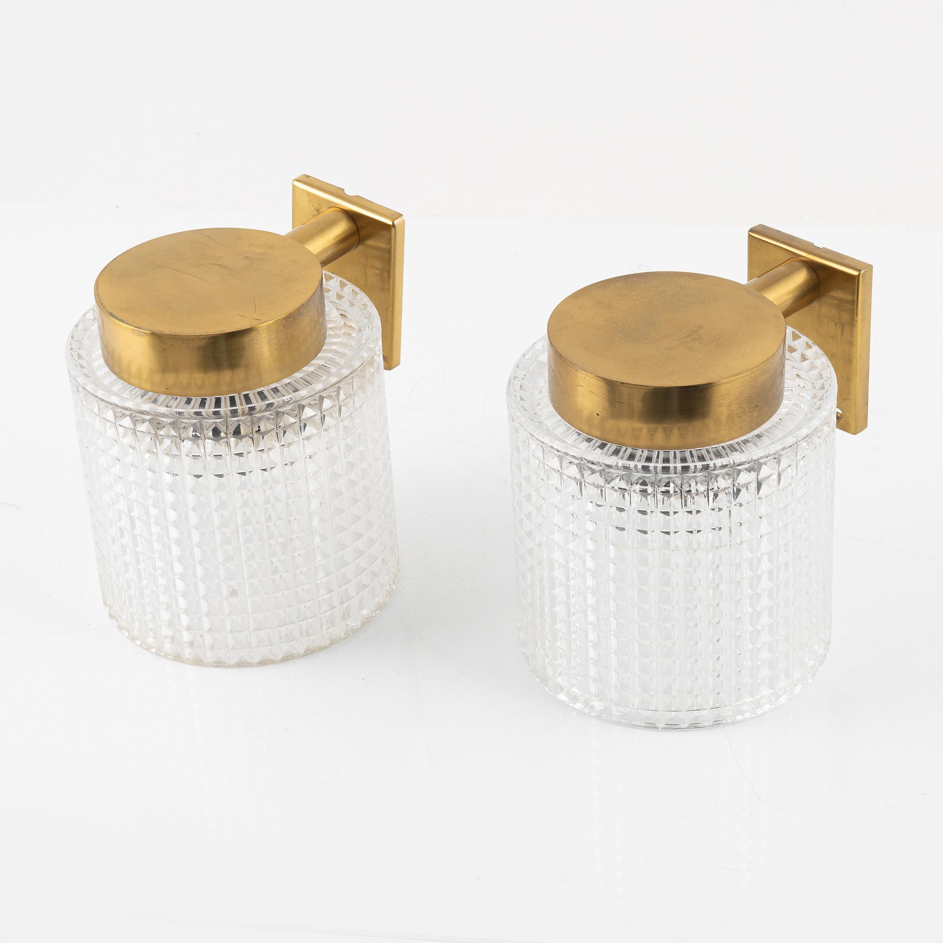 Swedish Carl Fagerlund for Orrefors Brass and Glass Pair of Sconces Sweden 1960 For Sale