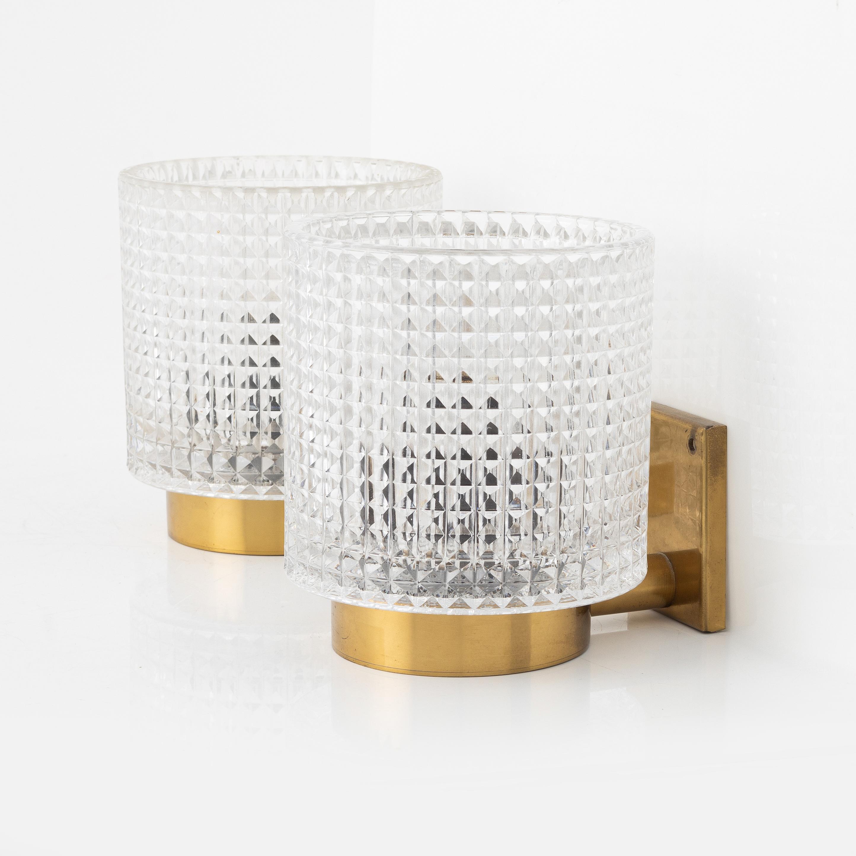 20th Century Carl Fagerlund for Orrefors Brass and Glass Pair of Sconces Sweden 1960 For Sale