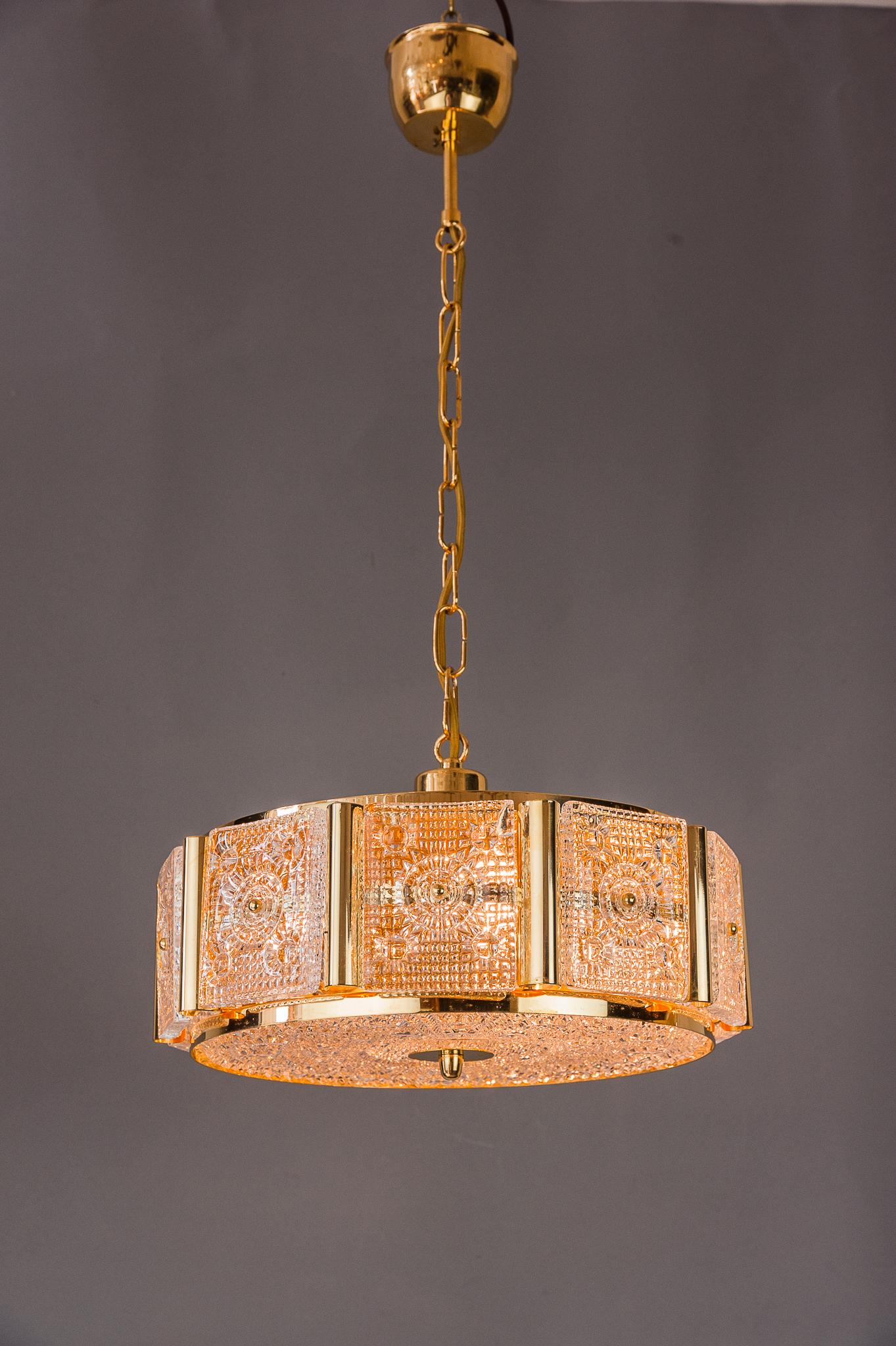 Swedish Carl Fagerlund for Orrefors, Gilded Brass, Chandelier For Sale