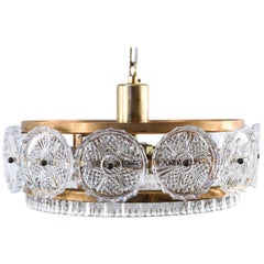 Carl Fagerlund for Orrefors Swedish Midcentury Glass 
Brass Pendant Chandelier