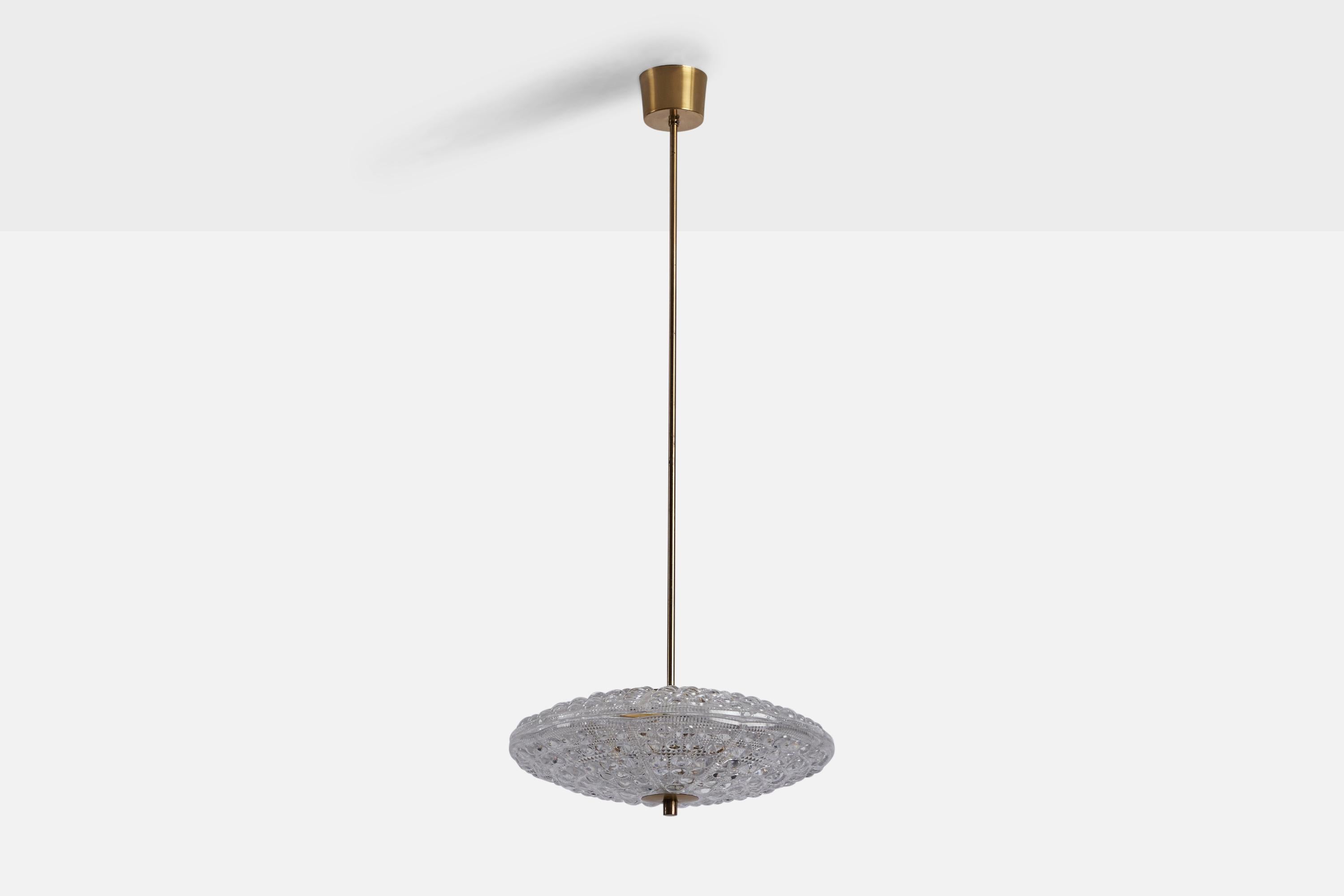 A brass and glass pendant light designed by Carl Fagerlund and produced by Orrefors, Sweden, 1950s.

Overall Dimensions (inches): 37.5” H x 16” Diameter
Bulb Specifications: E-14 Bulb
Number of Sockets: 6