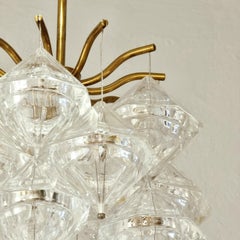 Carl Fagerlund, raro pendente in ottone e vetro di Orrefors. Midcentury svedese