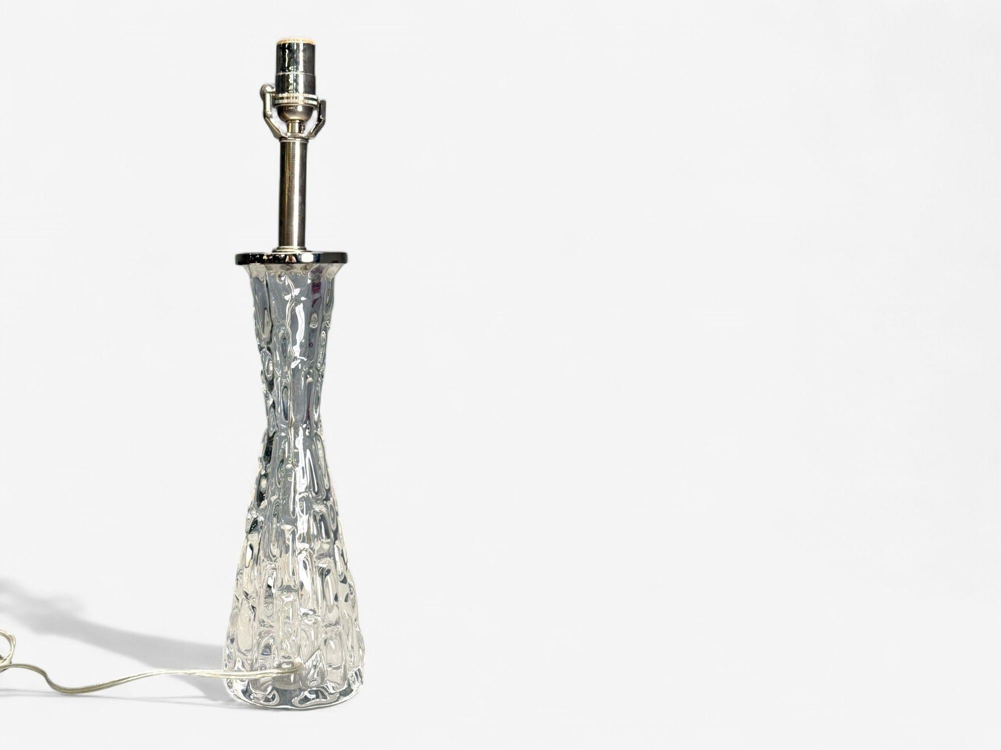 Carl Fagerlund, Swedish Modern, Textured Glass, Chrome, Table Lamp, Sweden, 1960s

A single hourglass shaped textured glass and chrome table lamp designed by Carl Fagerlund for Orrefors in Sweden c. 1960s

Glass, Chrome; Sweden c. 1960s

Height:  21
