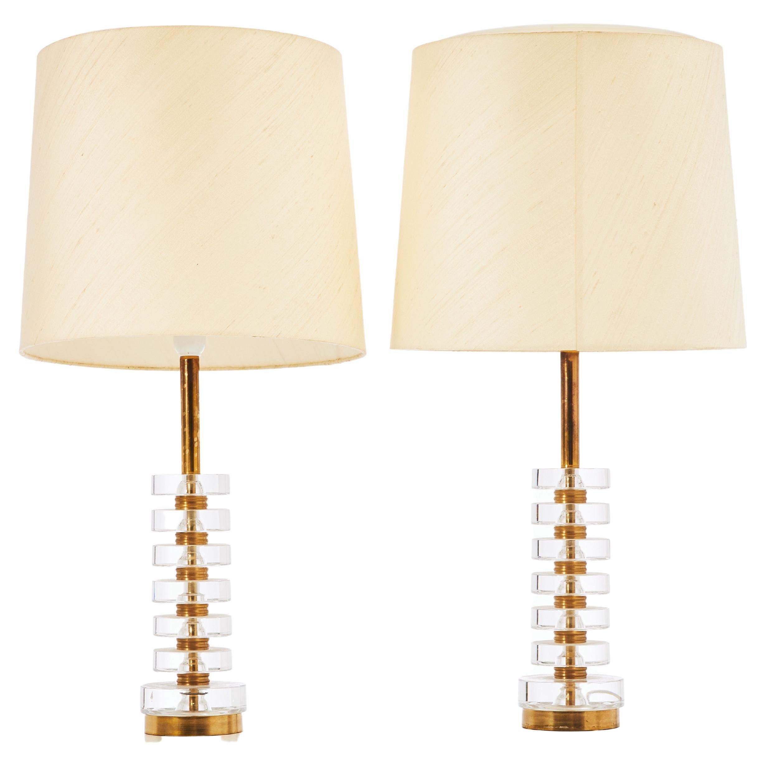 Lampade da tavolo di Carl Fagerlund per Orrefors: una coppia di lampade in vetro fuso e ottone Svezia 1960 in vendita