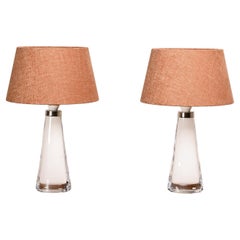 Carl Fagerlund white glass table lamps and dark ochre shades for Orrefors Sweden