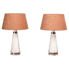 Carl Fagerlund white glass table lamps and dark ochre shades for Orrefors Sweden