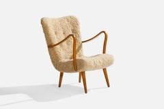 Carl Gustaf Hiort Af Ornäs, Lounge Chair, Wood, Sheepskin, Finland, 1950s