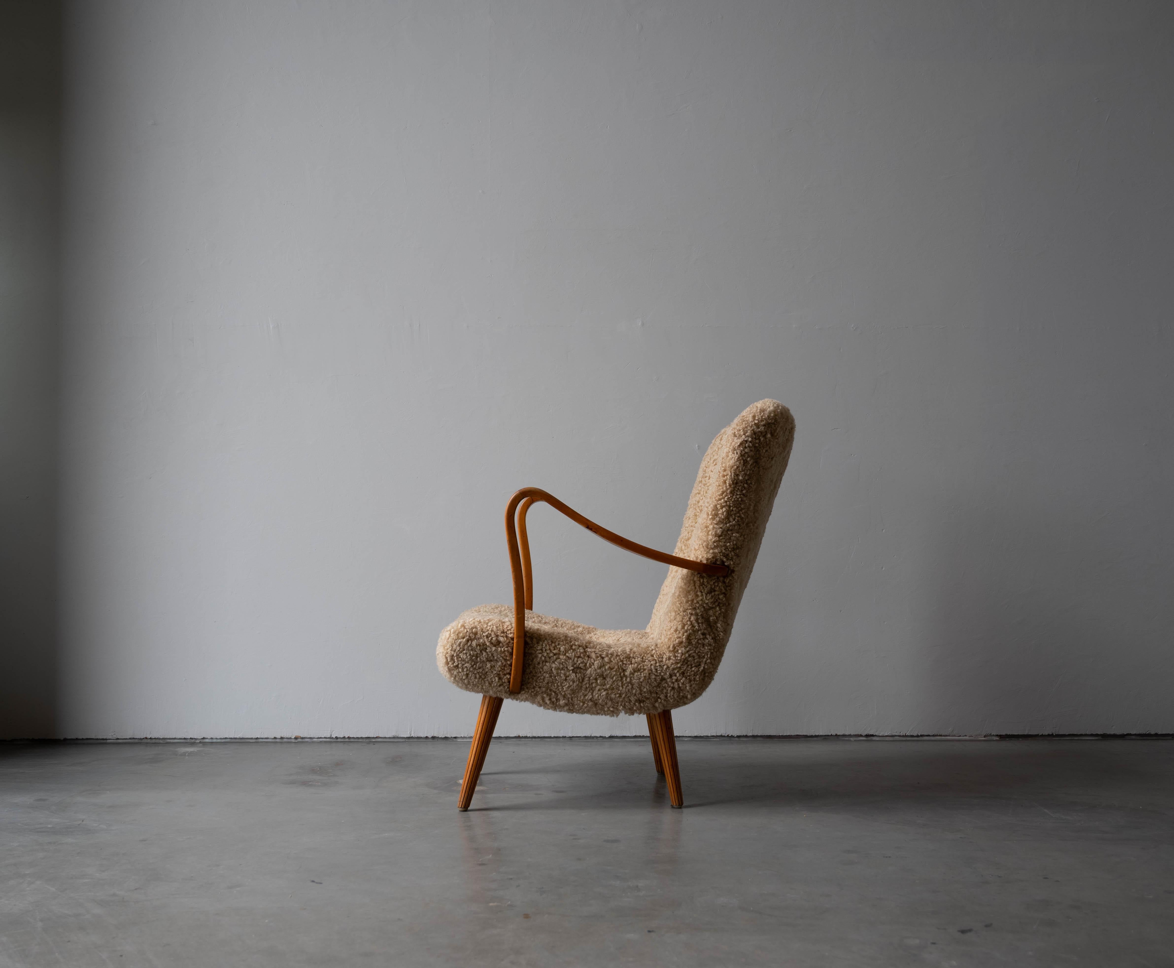 Mid-Century Modern Carl Gustaf Hiort Af Ornäs, Lounge Chair, Wood, Sheepskin, Sweden, 1950s