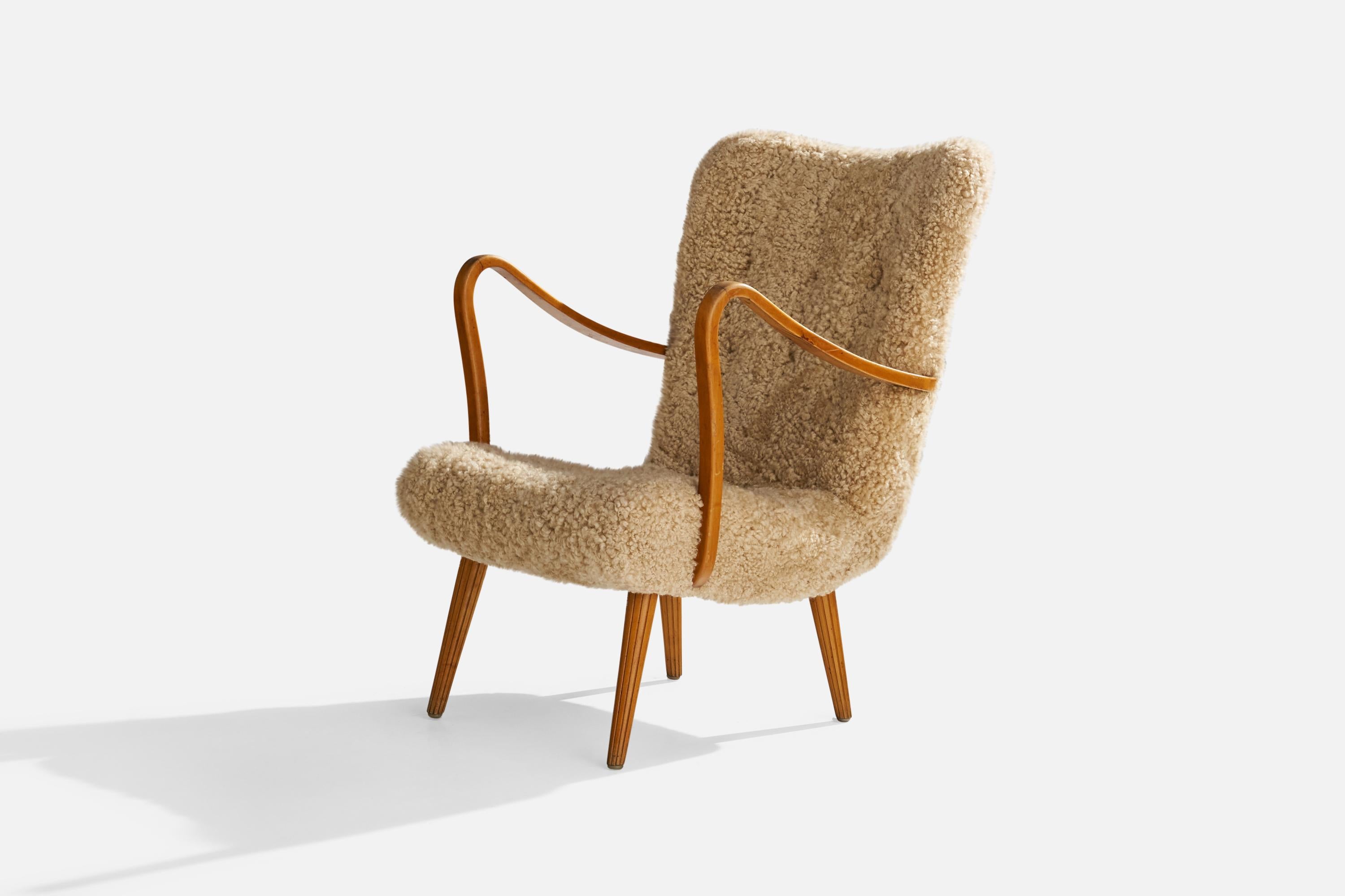 Mid-20th Century Carl Gustaf Hiort Af Ornäs, Lounge Chair, Wood, Sheepskin, Sweden, 1950s For Sale