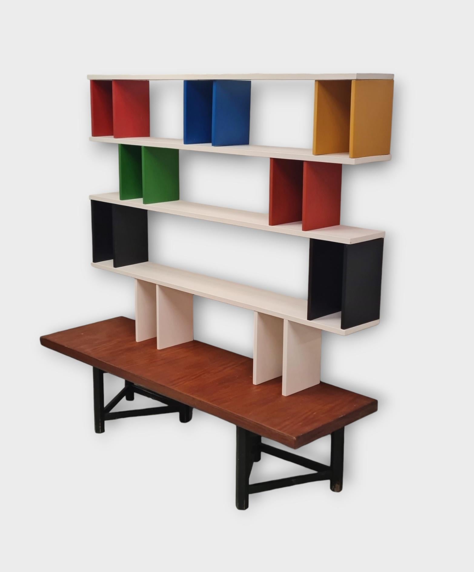 Hiort af Ornäs designed this type shelf in the 1950s. It is called the `Välipala hylly` in Finnish, and it has become a classic a long time ago. Actually, it has been taken again into production not so long ago. 

This is a very simple, practical