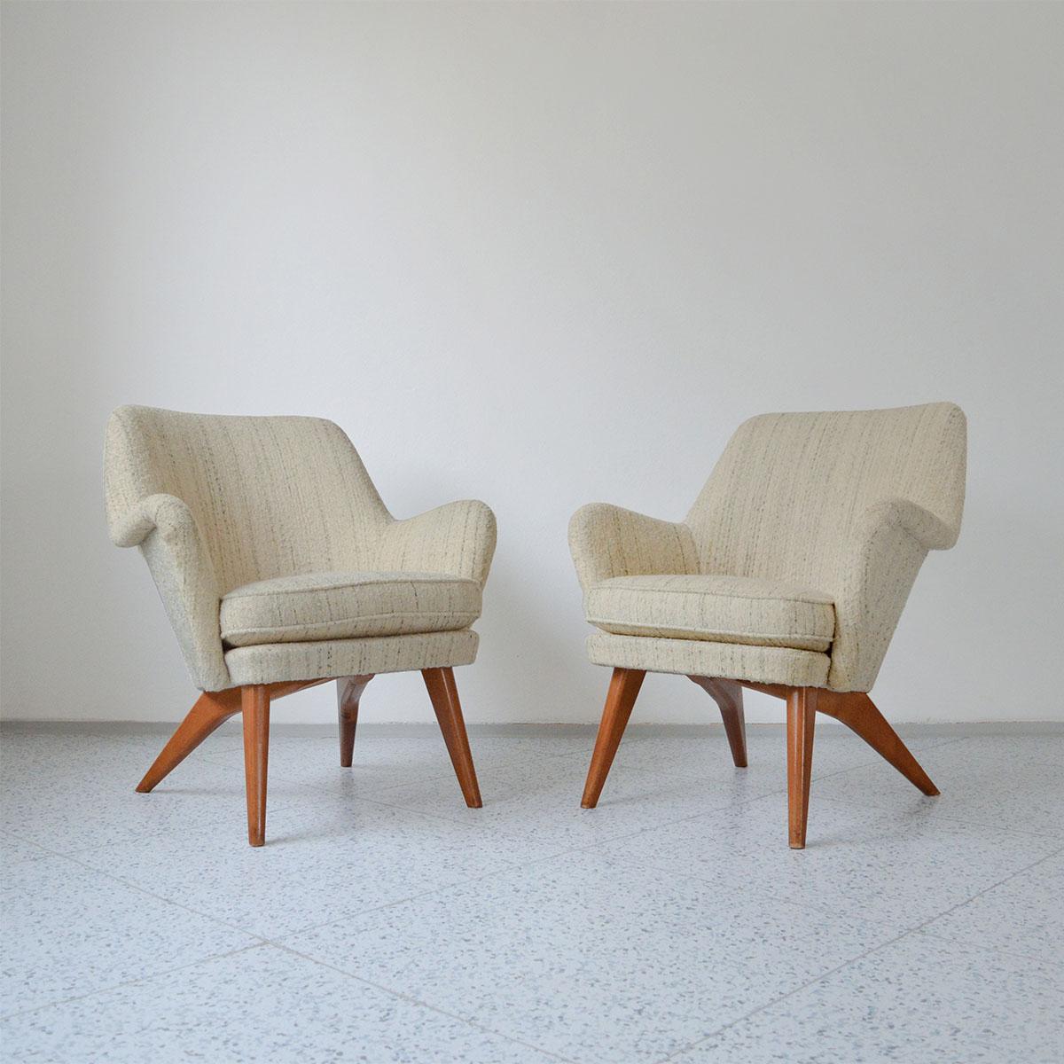 Pair of Finnish armchairs model “Pedro” designed by Carl Gustaf Hiort af Ornäs for Puunveisto Oy in Finland, 1950s.

Designed by renowned Finnish architect Carl Gustaf Hiort af Ornäs, these armchairs feature a unique curved, sculptural design and