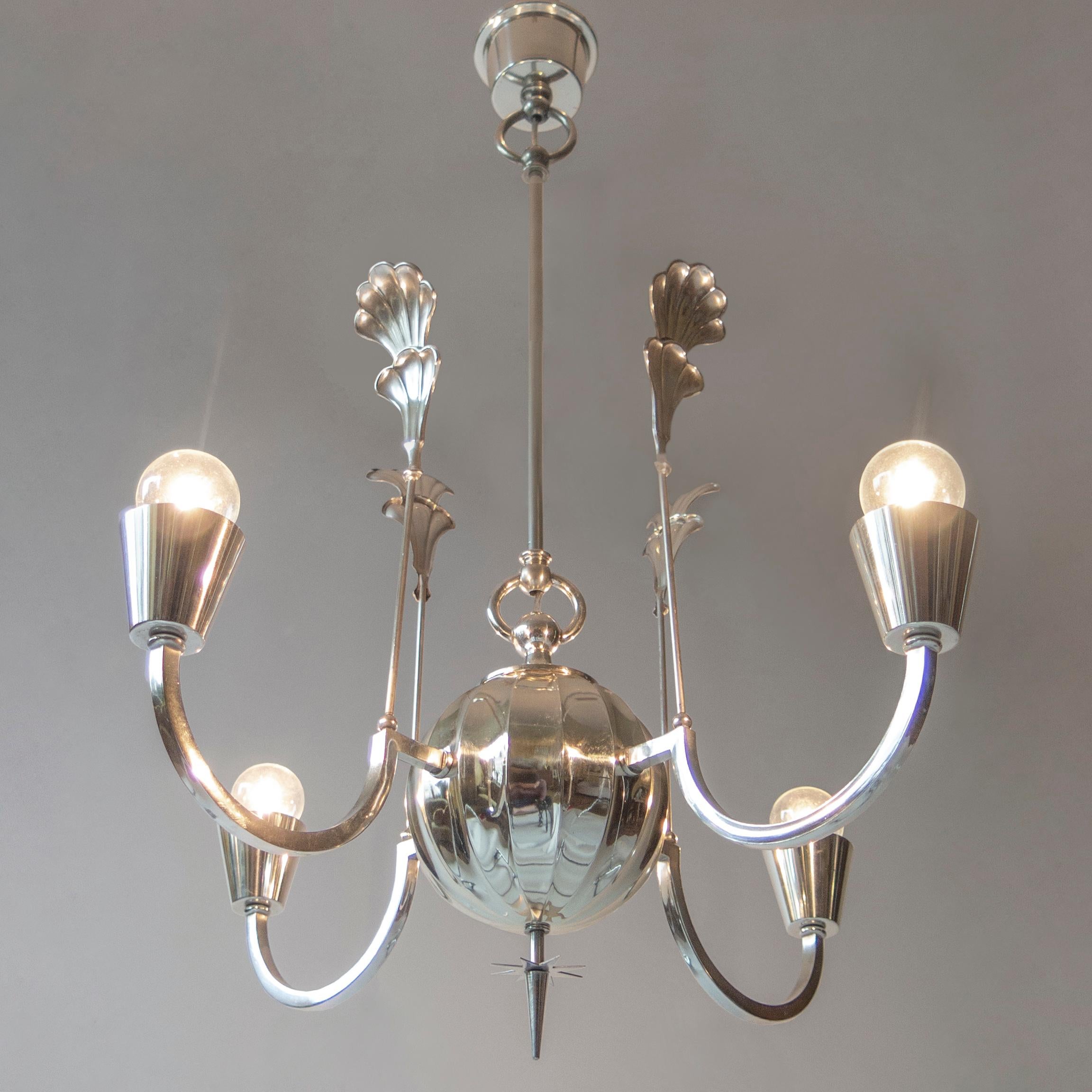 Design attributed to the iconic Swedish lighting designer Elis Bergh and expertly crafted by the preeminent Swedish metalworker C.G. Hallberg. The tapering canopy, above ring fasteners and a central hanging rod, the scalloped and spherical body