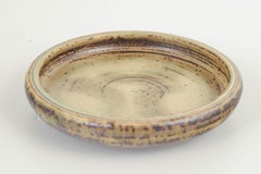 Carl Halier for Royal Copenhagen. Low stoneware bowl with subtle glaze. 1965