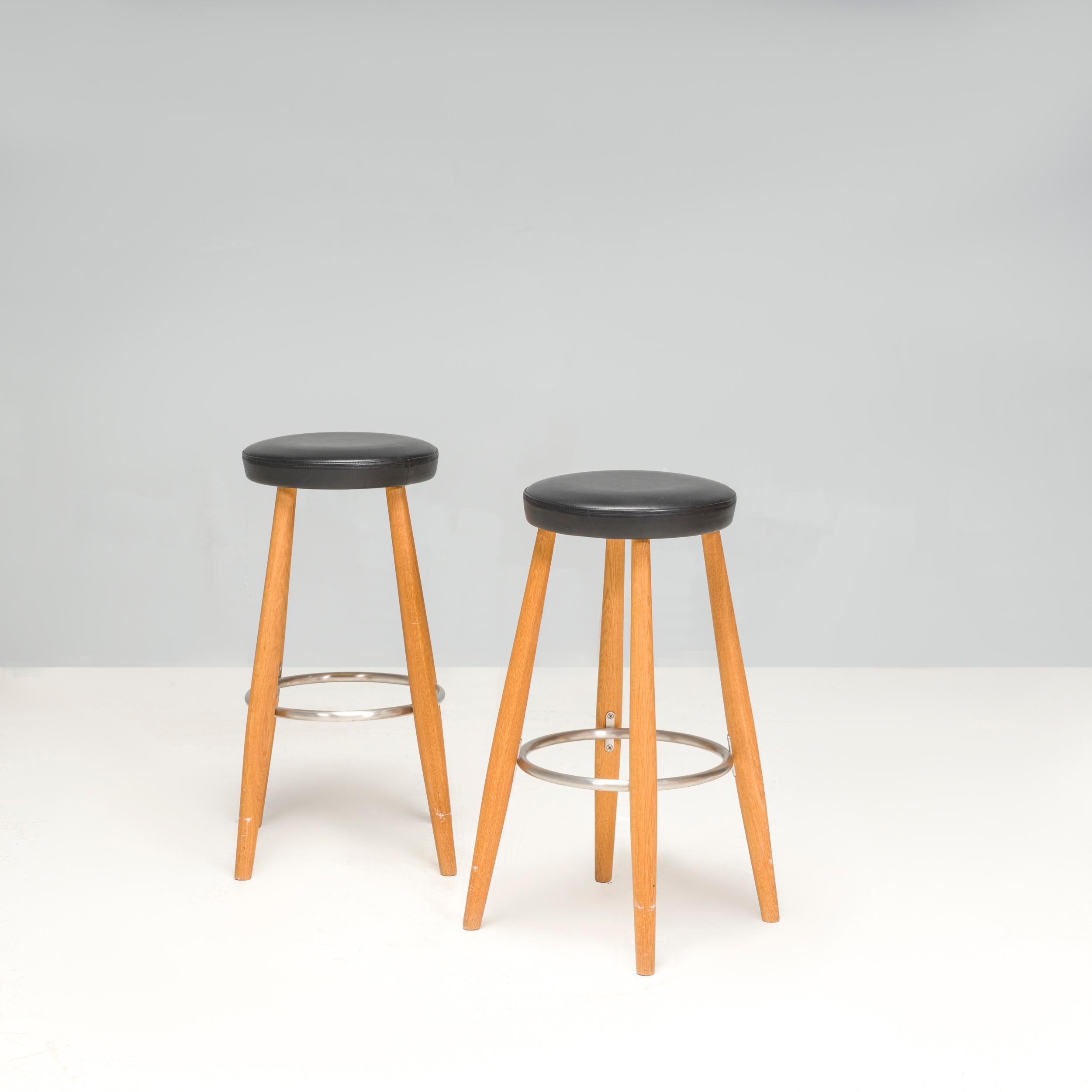 Originally designed by Hans J. Wegner in 1985, this set of CH56 stools was manufactured by Carl Hansen in 2008.

One of Wegner’s most iconic seating designs, the bar stool is constructed from four solid oak legs which are slightly angled and held in