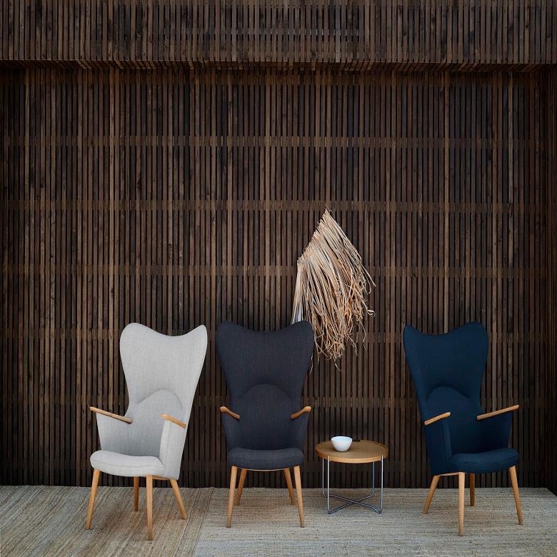 Affectionately known as the Mama Bear chair, the CH78 lounge chair was originally introduced in 1954, and was an extension of Wegner’s CH71 ‘Mini Bear’ Chair (1952) design. Defined by a series of inviting curves that offer up a warm embrace, the