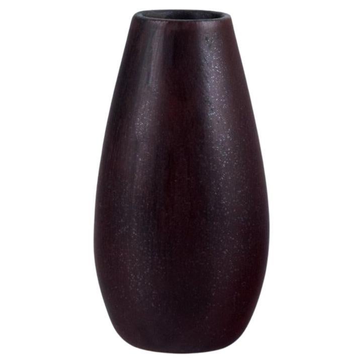 Carl Harry Staahlane for Roerstrand. Miniature vase with brown glaze For Sale