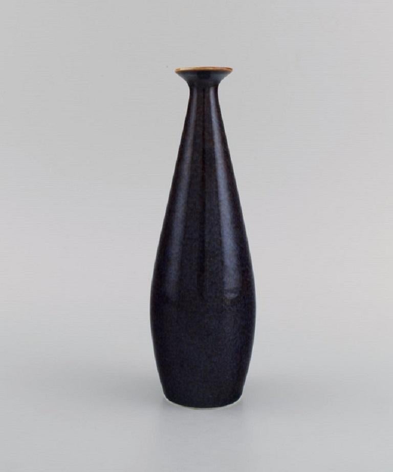 Carl Harry Ståhlane (1920-1990) for Rörstrand. 
Vase in glazed ceramics. Beautiful speckled glaze. 1960s.
Measures: 22.5 x 7 cm.
In excellent condition.
Signed.