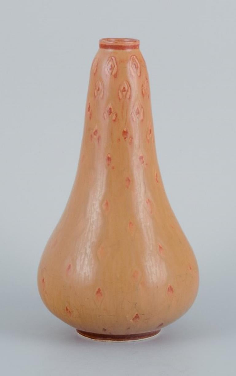 Carl Harry Ståhlane (1920-1990) for Rörstrand. Vase in light brown tones.
Mid-20th century.
First sorting.
Signed.
In perfect condition.
Dimensions: H 19.0 x D 10.0 cm.