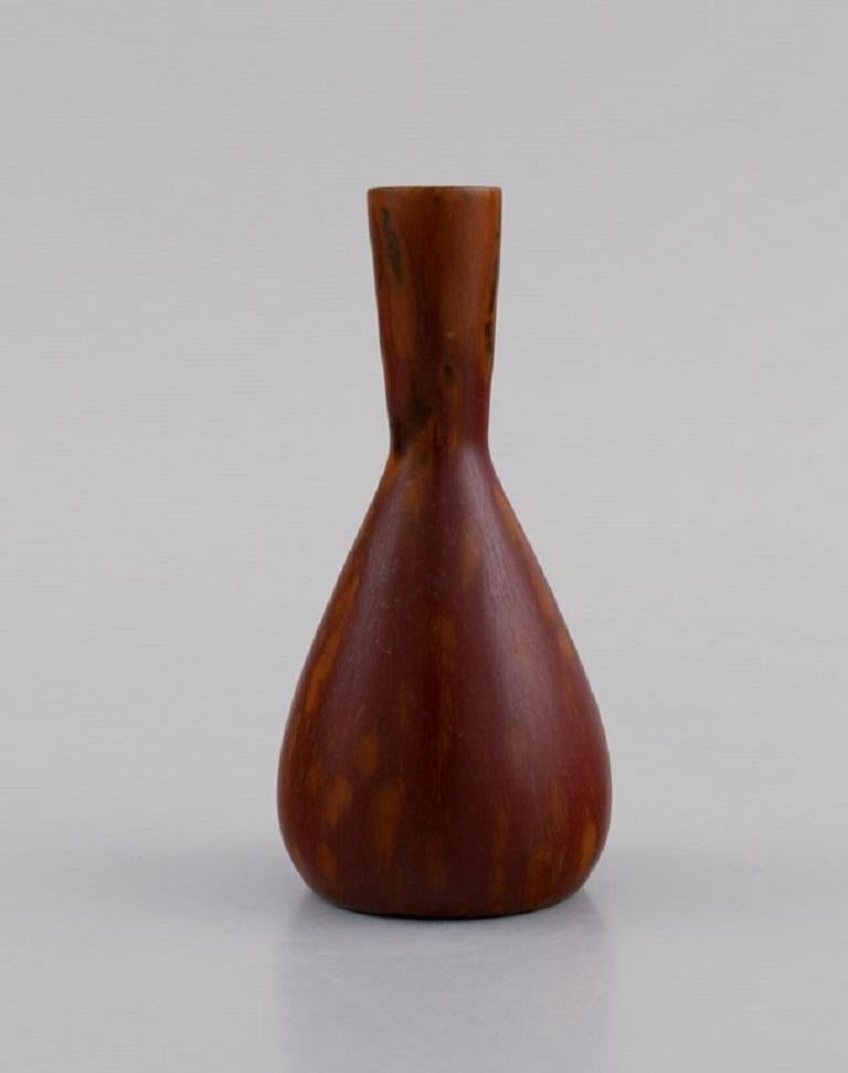 Carl Harry Stålhane (1920-1990) for Rörstrand. 
Vase in glazed ceramics. Beautiful glaze in reddish-brown shades. 1960s.
Measures: 10.5 x 5.2 cm.
In excellent condition.
Stamped.
1st factory quality.