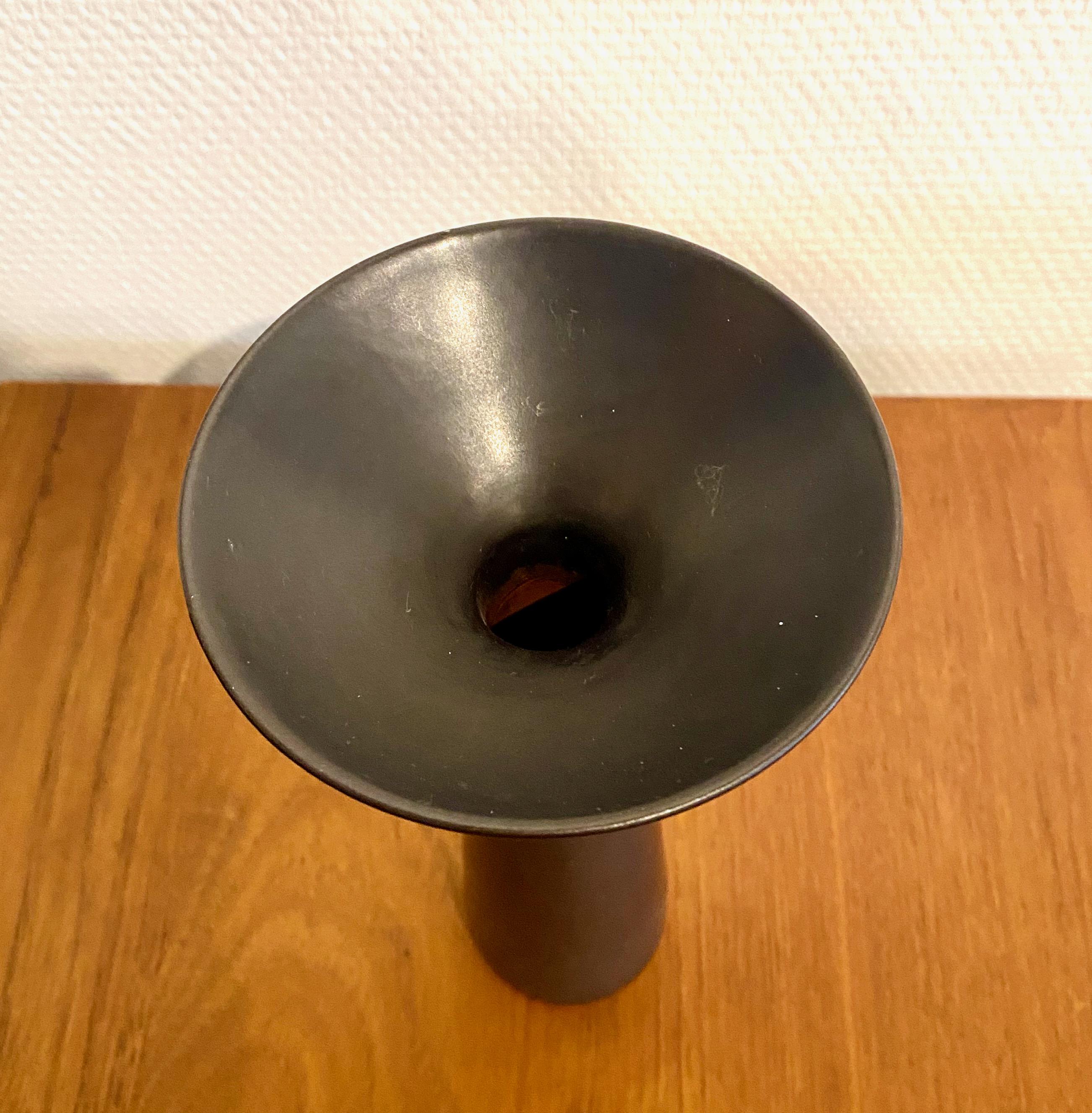 Black stoneware vase designed by Carl-Harry Stålhane for Rörstrand Sweden. The black items by Stålhane has become highly sought after by collectors.