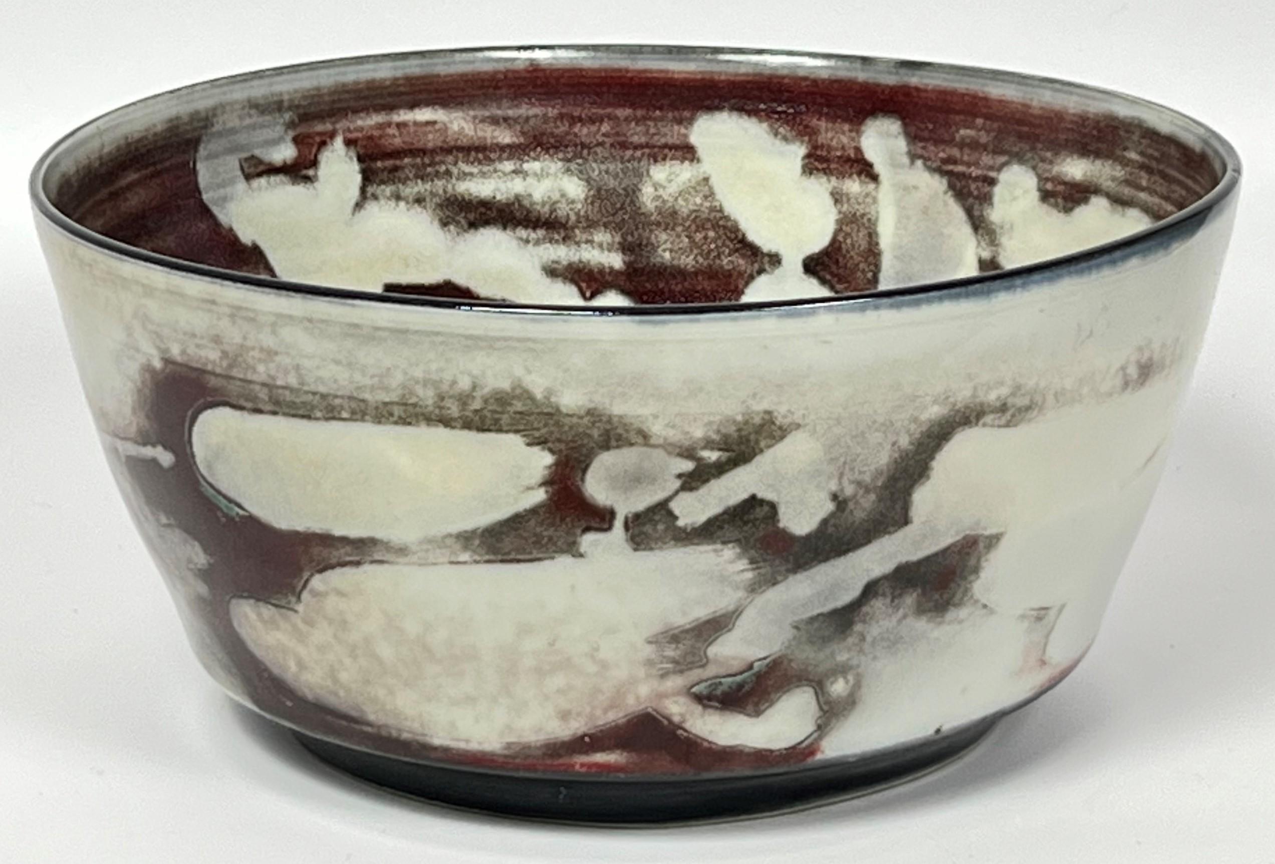 Carl Harry Stalhane opened Designhuset in Sweden in 1973 after decades as as an important artist at Rorstrand. This hand thrown and hand decorated porcelain bowl features a copper reduction glaze that is particularly elusive at high temperatures.