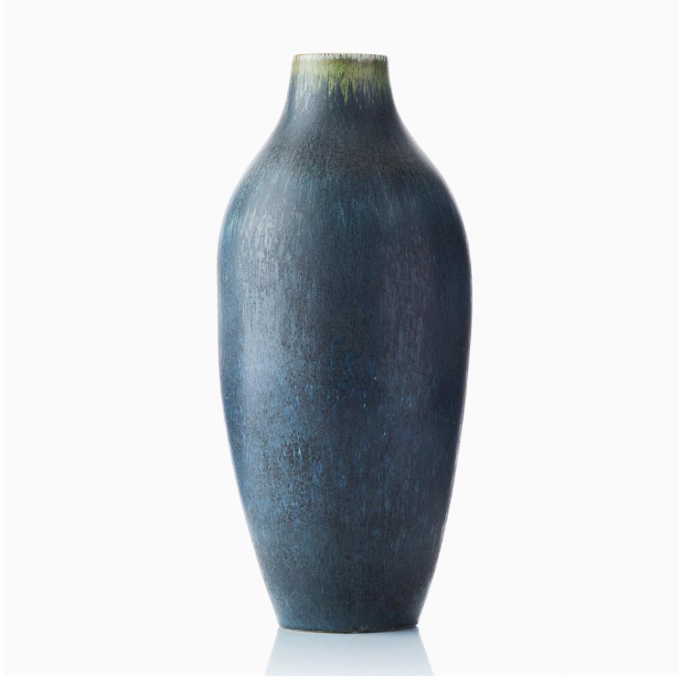 Carl-Harry Stålhane (1920‑1990). Floor vase. Rörstrand. Signed with crowned R SWEDEN and CHS SDA. Stoneware, glaze in blue tones. H 20″. D 8.3