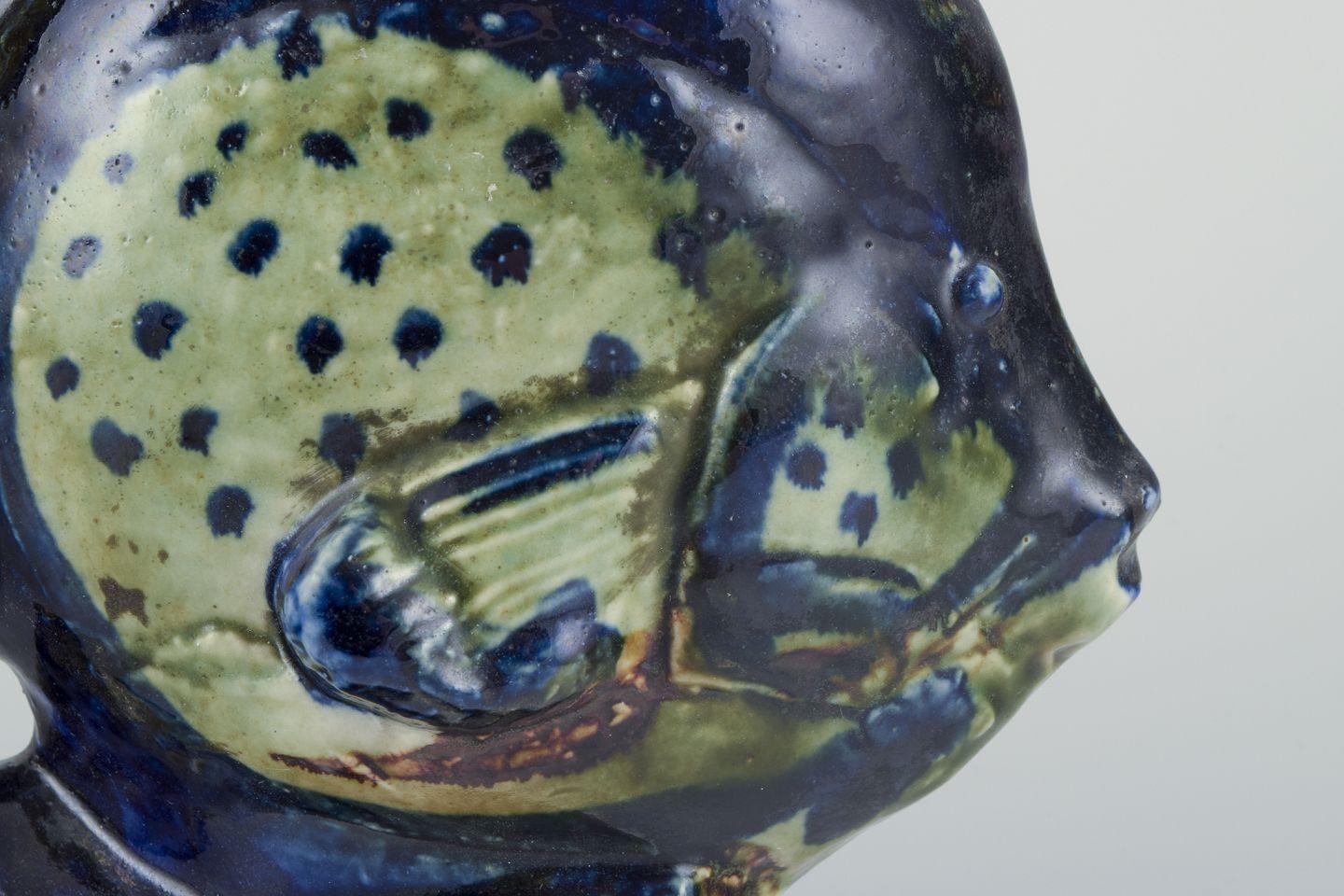 Pre-owned goods are exempt from import duties for U.S. customers. 
Therefore, no import tariffs will be applicable to your purchase.

Carl Harry Stålhane (1920-1990) for Designhuset, Sweden.
Unique sculpture of a fish in stoneware. Polychrome