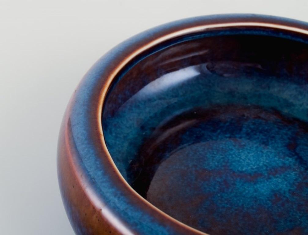 Scandinavian Modern Carl Harry Stålhane for Rörstrand. Ceramic bowl in blue-brown shades For Sale