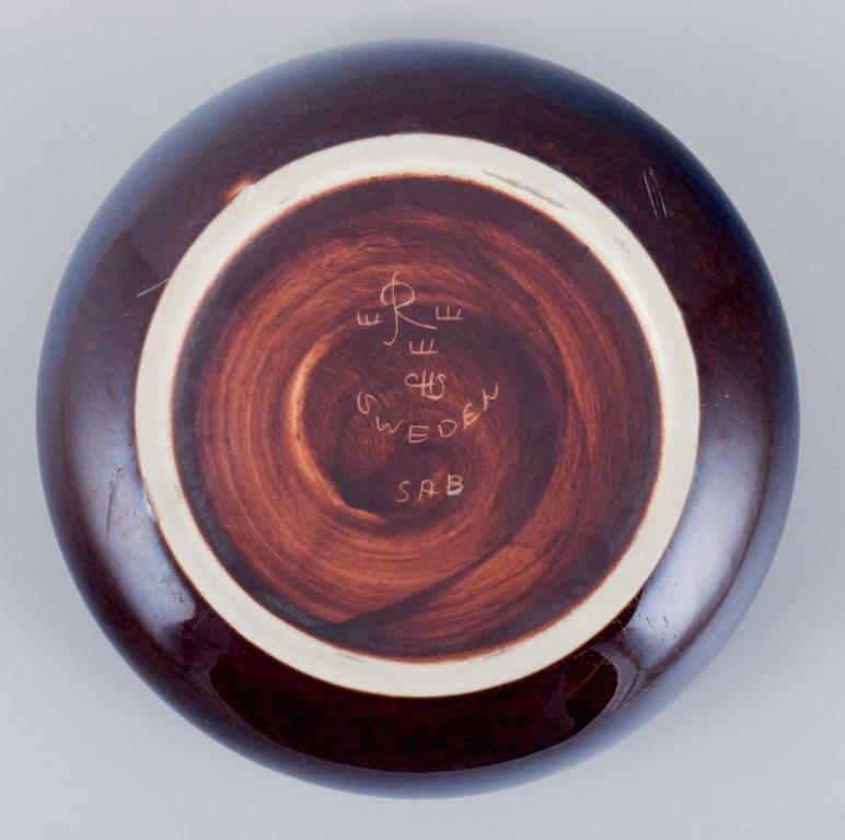 Glazed Carl Harry Stålhane for Rörstrand. Ceramic bowl in blue-brown shades For Sale