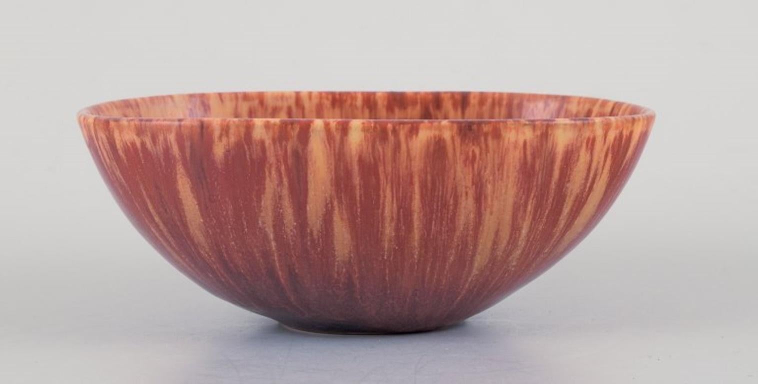 Carl-Harry Stålhane for Rörstrand, ceramic bowl in shades of brown.
Mid-20th century.
Perfect condition.
Marked.
Second factory quality.
Dimensions: L 12.0 cm. x D 8.7 cm. x H 4.8 cm.