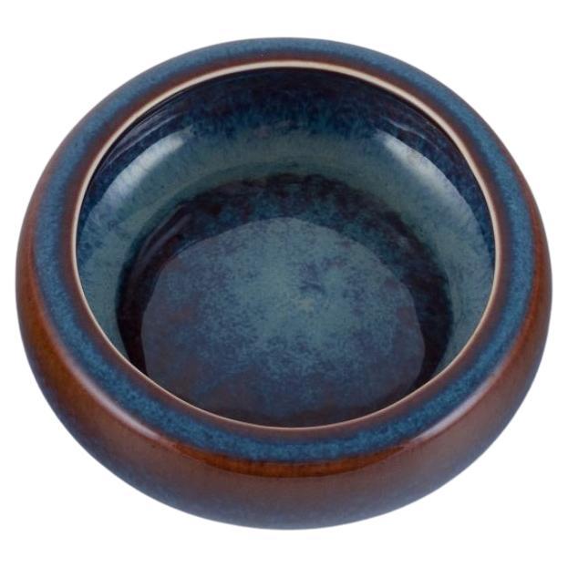Carl Harry Stålhane for Rörstrand. Ceramic bowl with blue and brown glaze