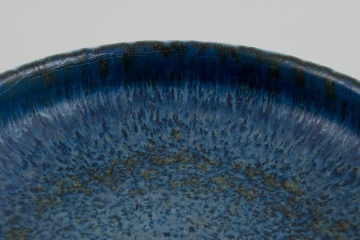 Glazed Carl Harry Stålhane for Rörstrand. Ceramic bowl with blue-toned glaze For Sale