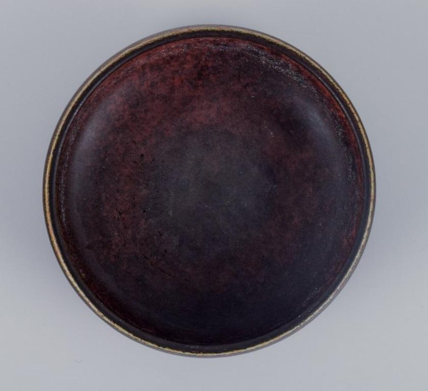 Scandinavian Modern Carl Harry Stålhane for Rörstrand, ceramic bowl with glaze in brown tones.  For Sale